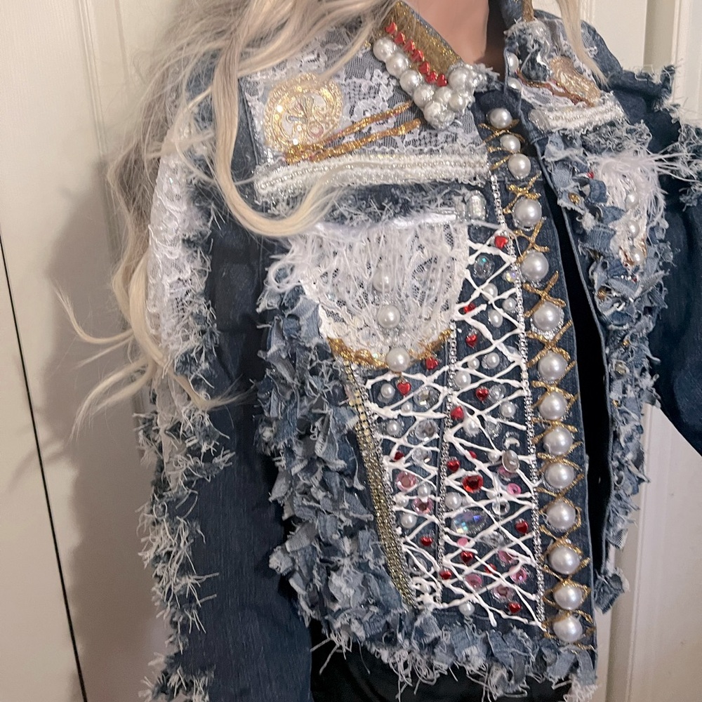 One of a kind women’s jean jacket.
Size Large 
You will definitely get noticed!